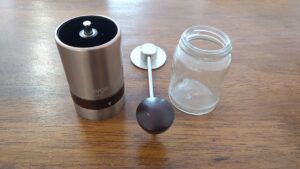 vevok chef manual coffee grinder, glass receptacle handle
